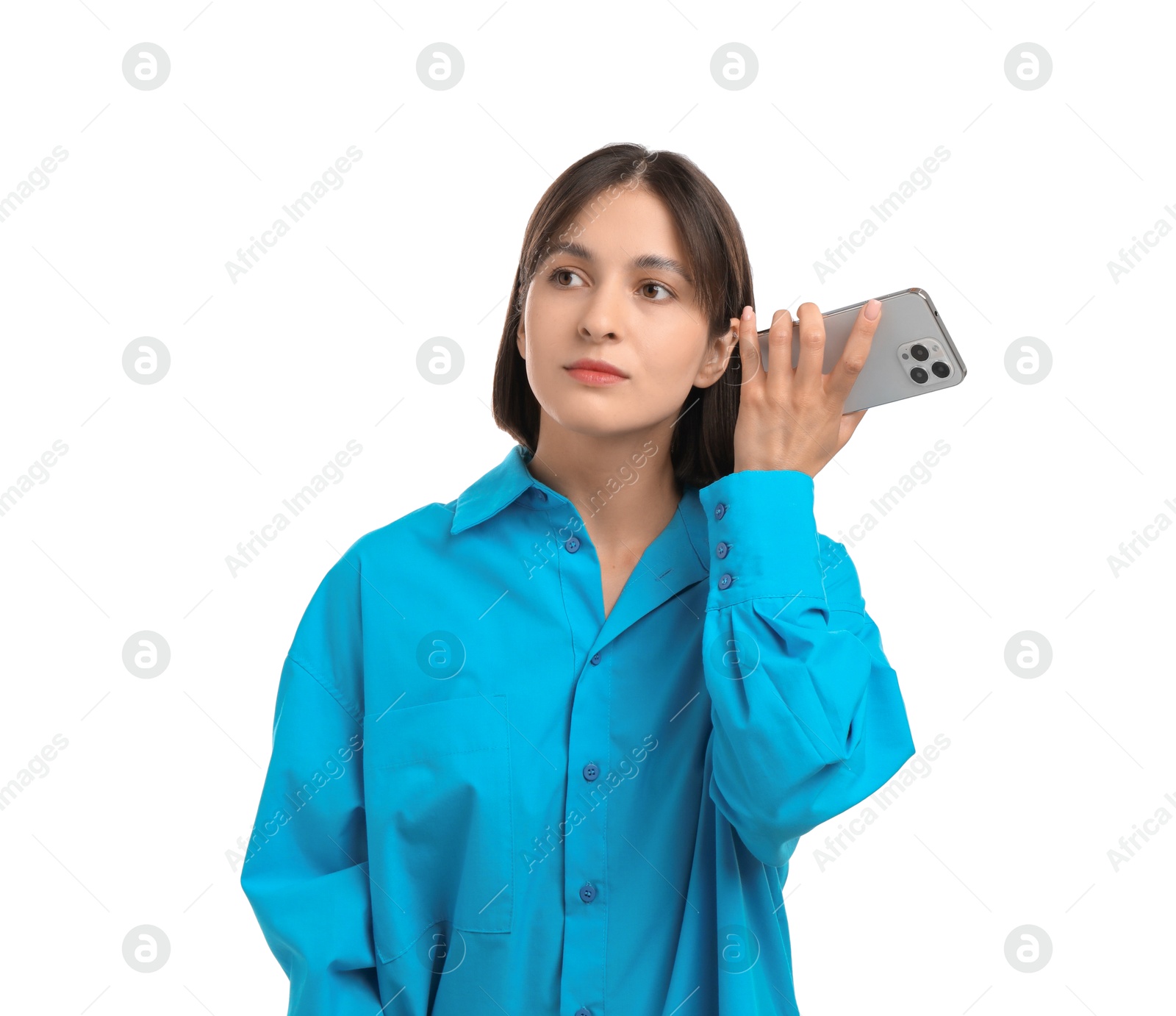 Photo of Beautiful woman with smartphone listening to voice message on white background