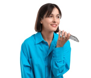 Photo of Beautiful woman recording voice message via smartphone on white background