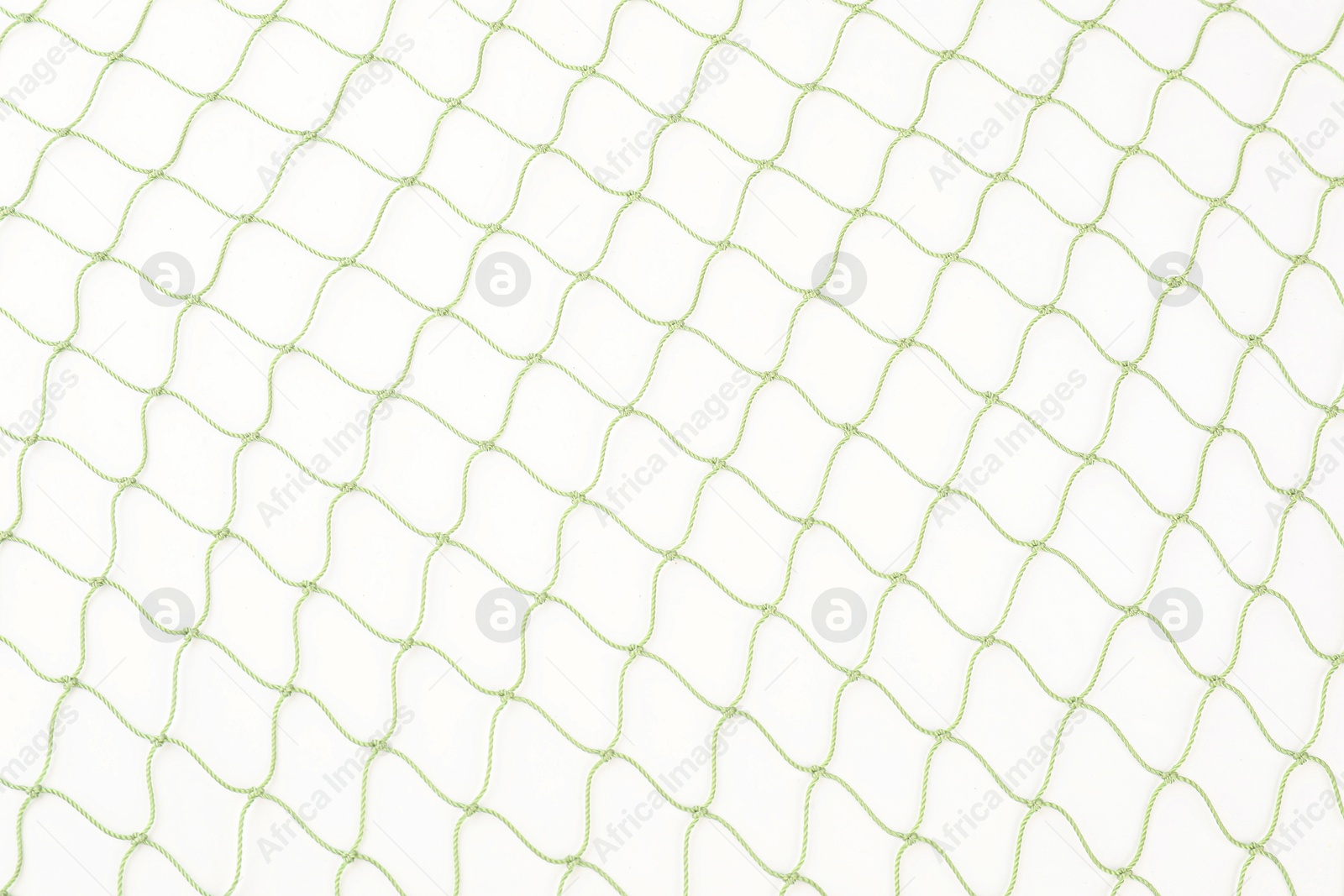 Photo of One green fishing net isolated on white, top view