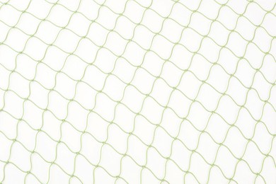 One green fishing net isolated on white, top view