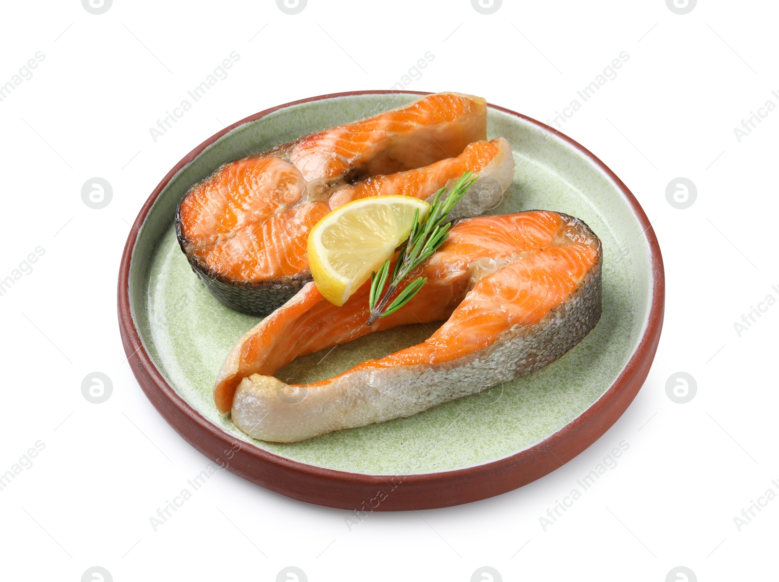 Photo of Tasty grilled salmon steaks, lemon and rosemary isolated on white