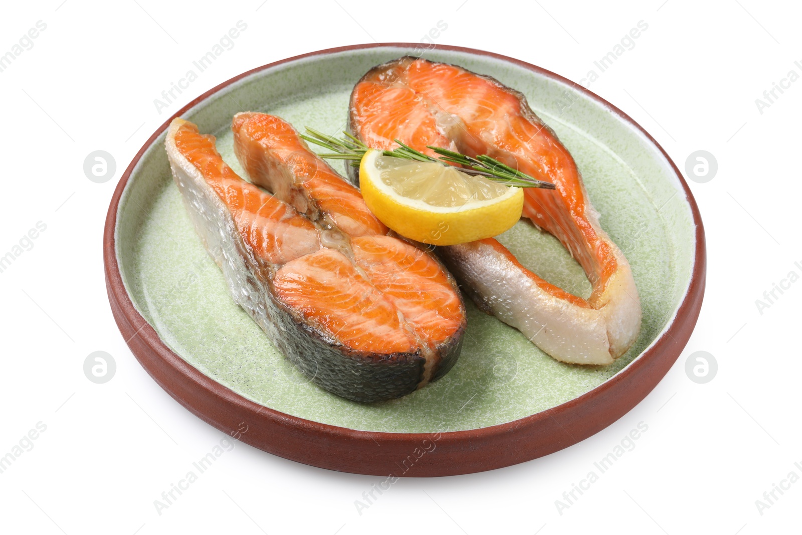 Photo of Tasty grilled salmon steaks, lemon and rosemary isolated on white