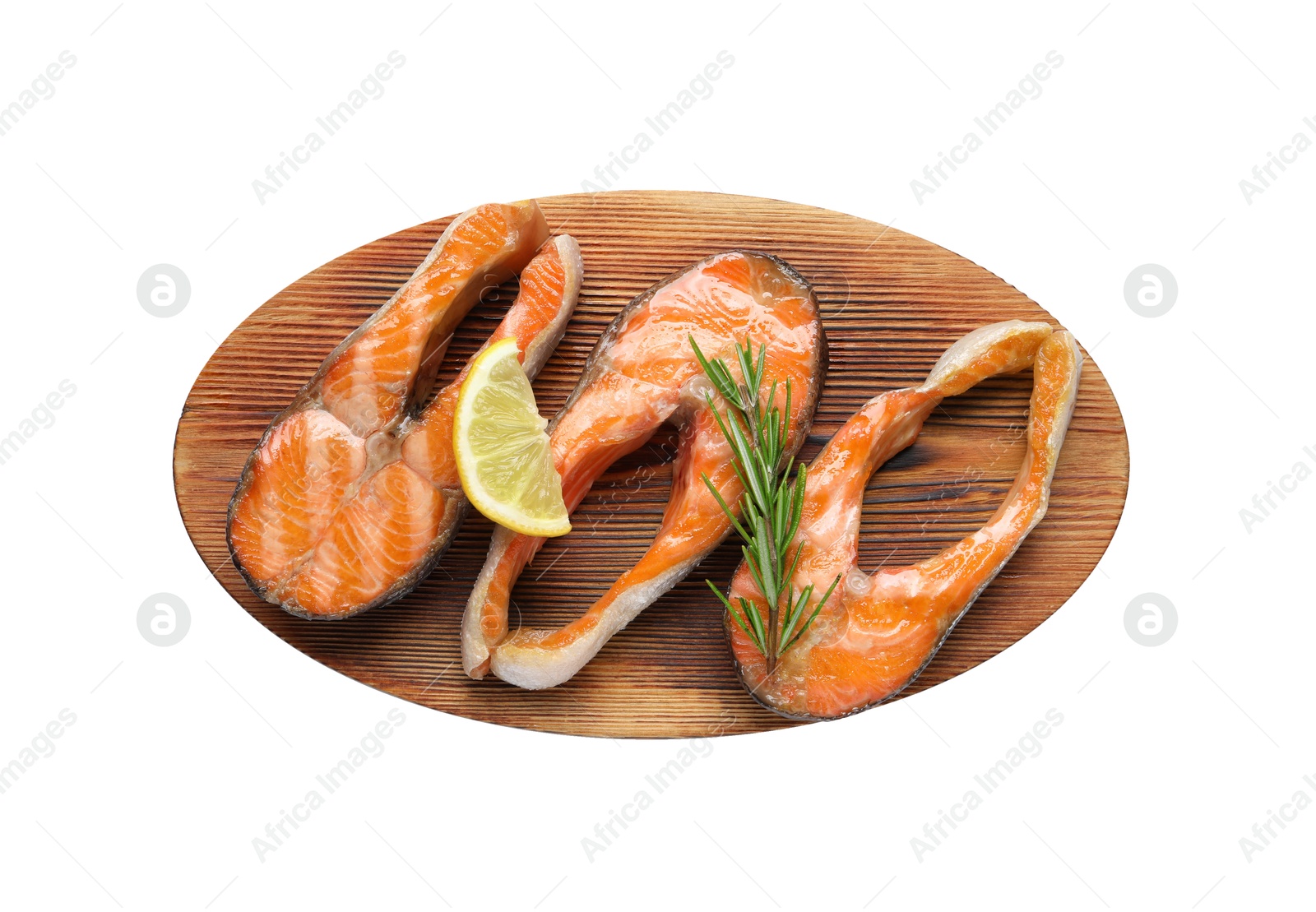 Photo of Tasty grilled salmon steaks, lemon and rosemary isolated on white, top view