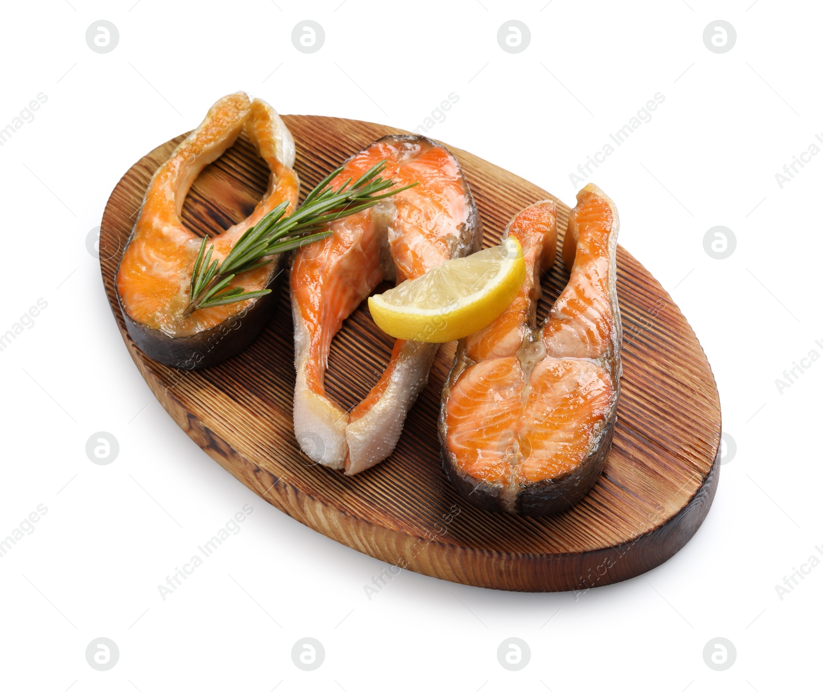 Photo of Tasty grilled salmon steaks, lemon and rosemary isolated on white