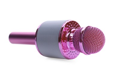 Photo of One pink karaoke microphone isolated on white