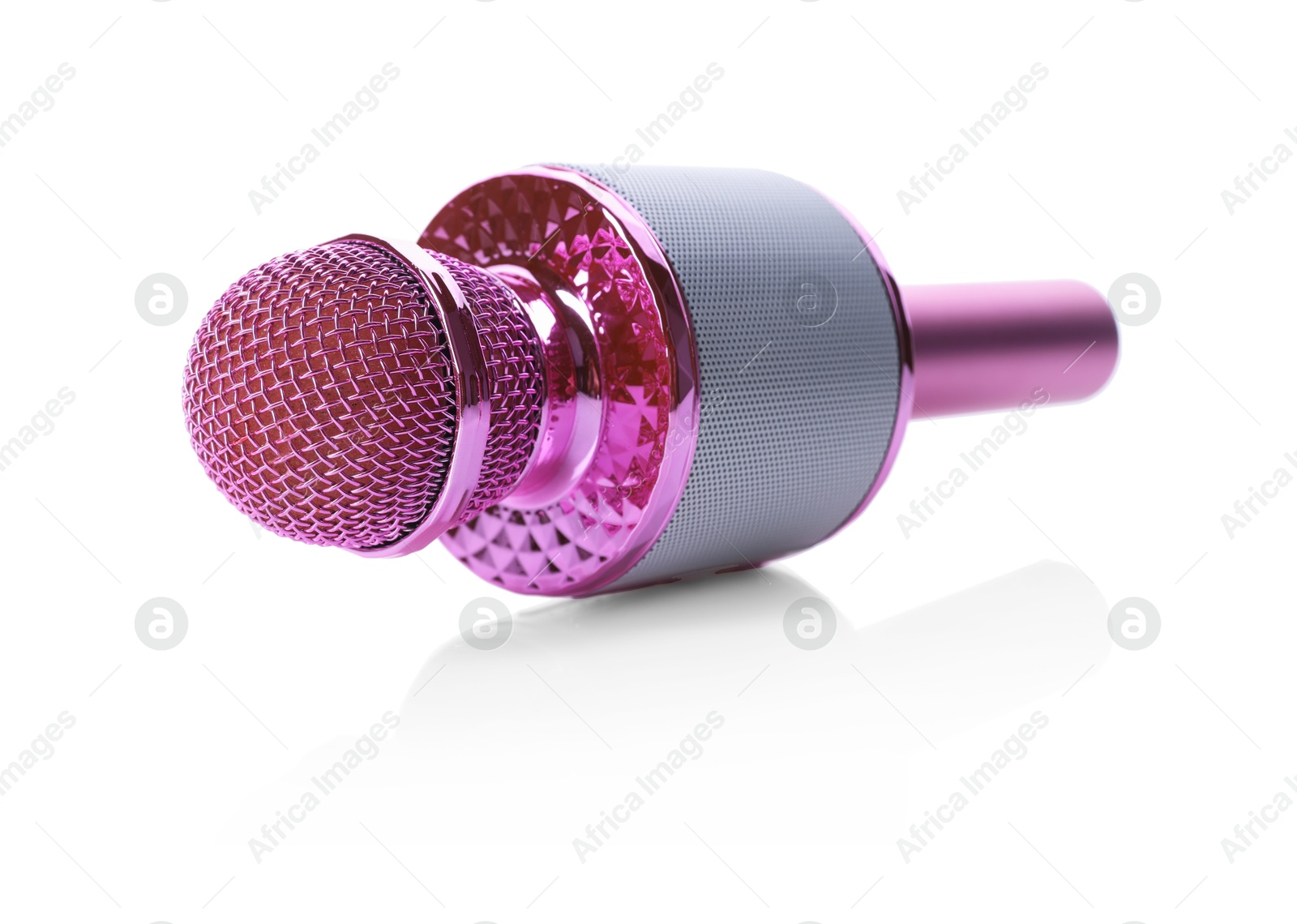 Photo of One pink karaoke microphone isolated on white