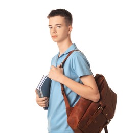 Photo of Portrait of teenage boy with backpack and books on white background