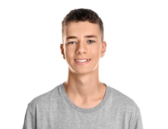 Photo of Portrait of teenage boy on white background