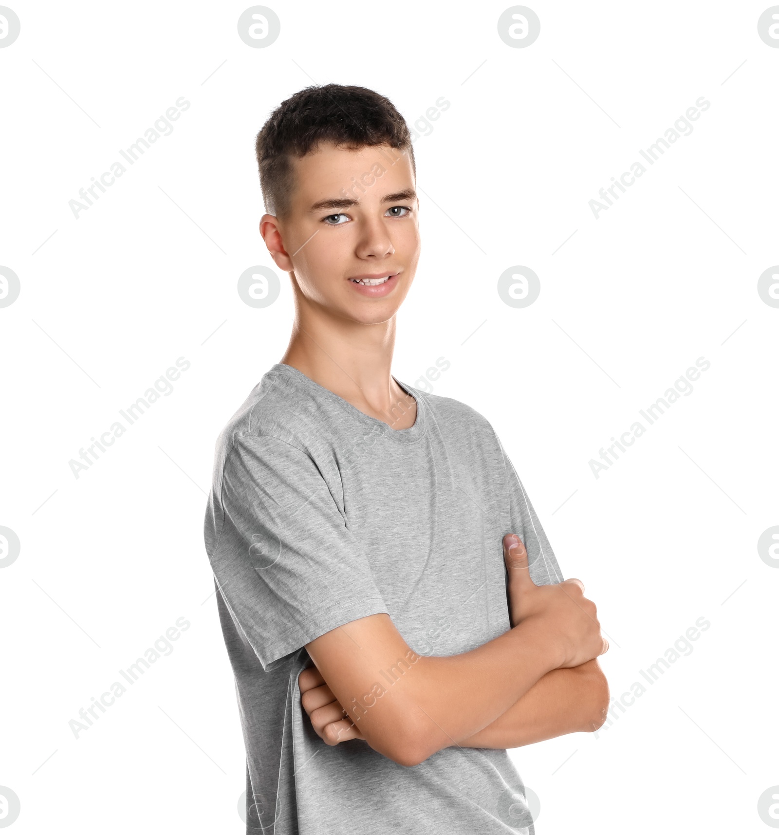 Photo of Portrait of teenage boy on white background