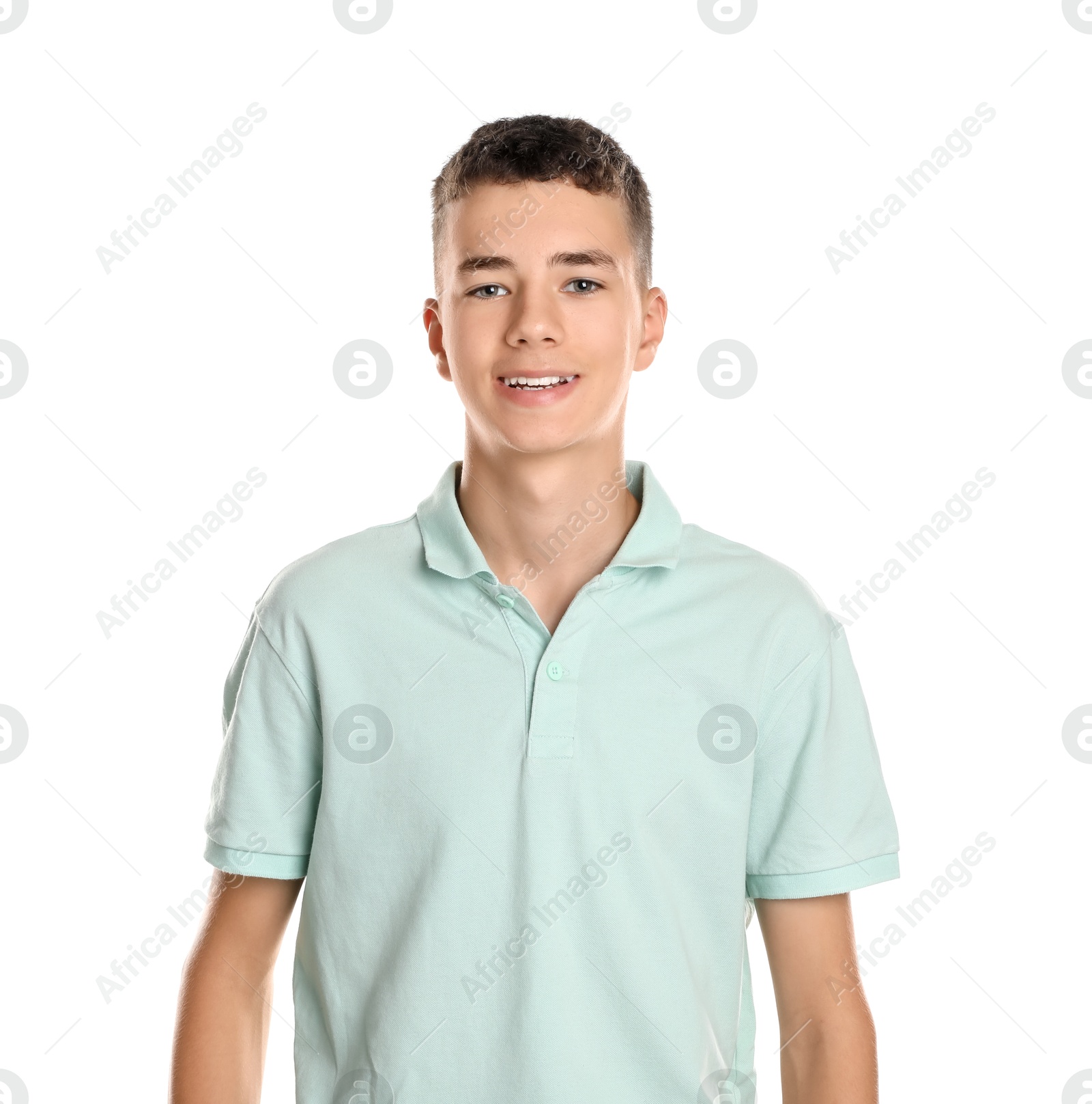 Photo of Portrait of teenage boy on white background