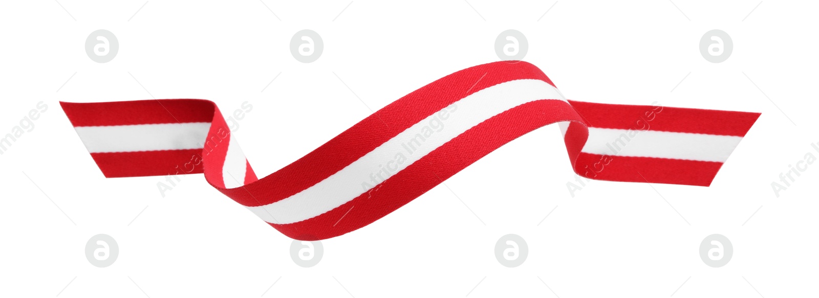 Photo of Ribbon in colors of Austrian flag isolated on white, top view