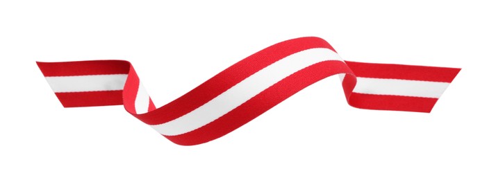 Ribbon in colors of Austrian flag isolated on white, top view