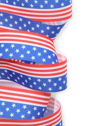 Ribbon in colors of American flag isolated on white, top view