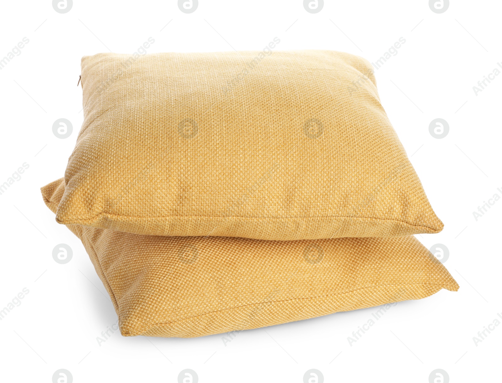 Photo of Two soft color pillows isolated on white