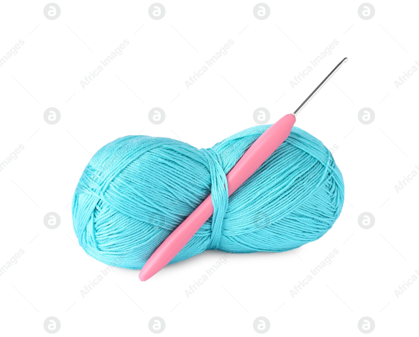 Photo of Skein of light blue yarn and crochet hook isolated on white