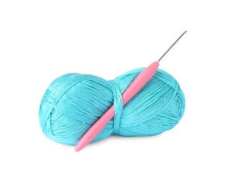 Photo of Skein of light blue yarn and crochet hook isolated on white