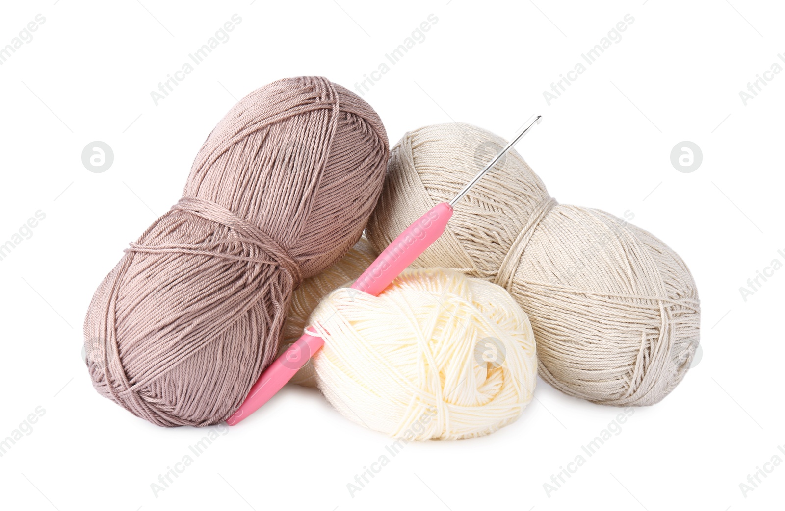 Photo of Skeins of colorful yarns and crochet hook isolated on white