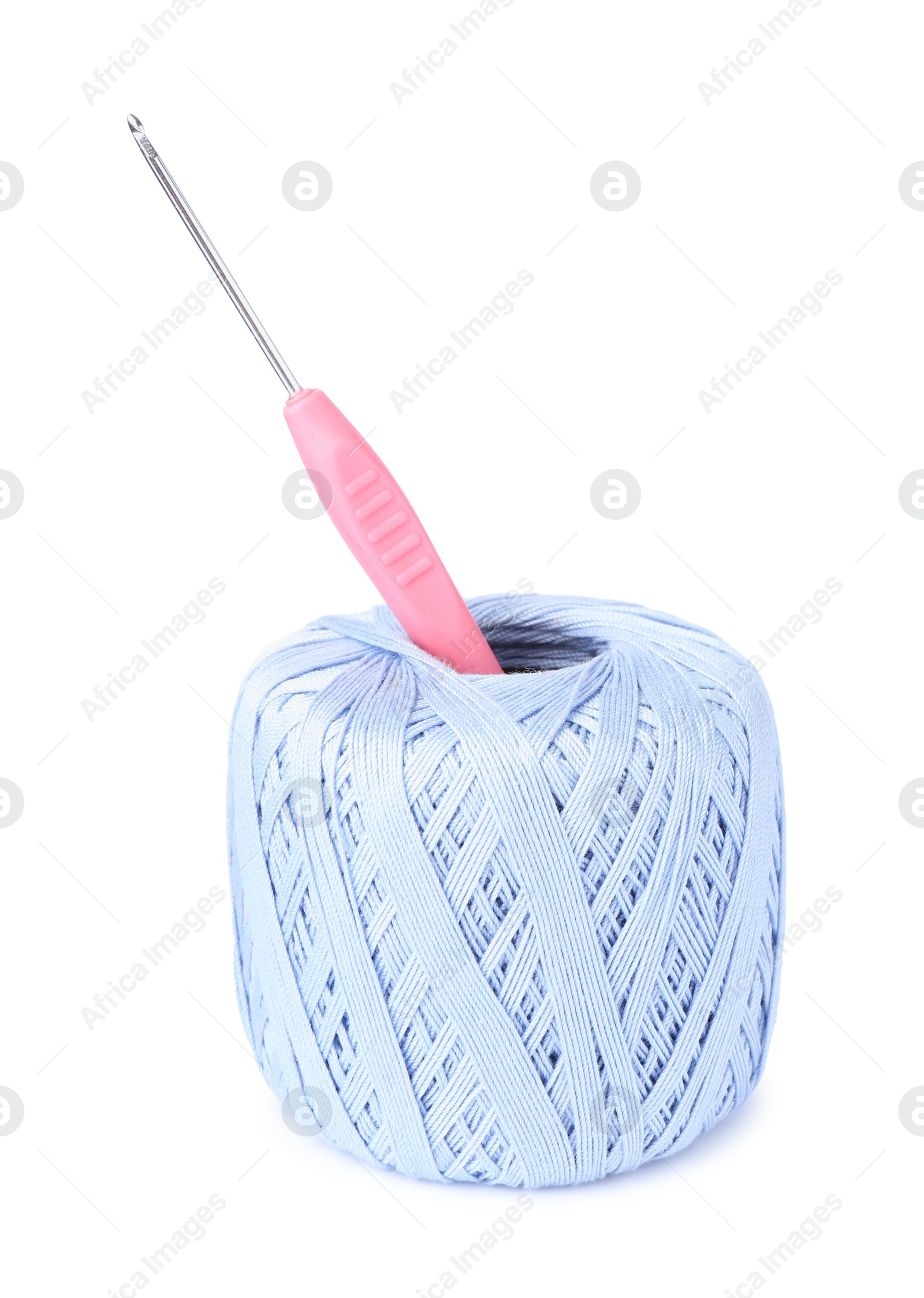 Photo of Thread of light blue yarn and crochet hook isolated on white