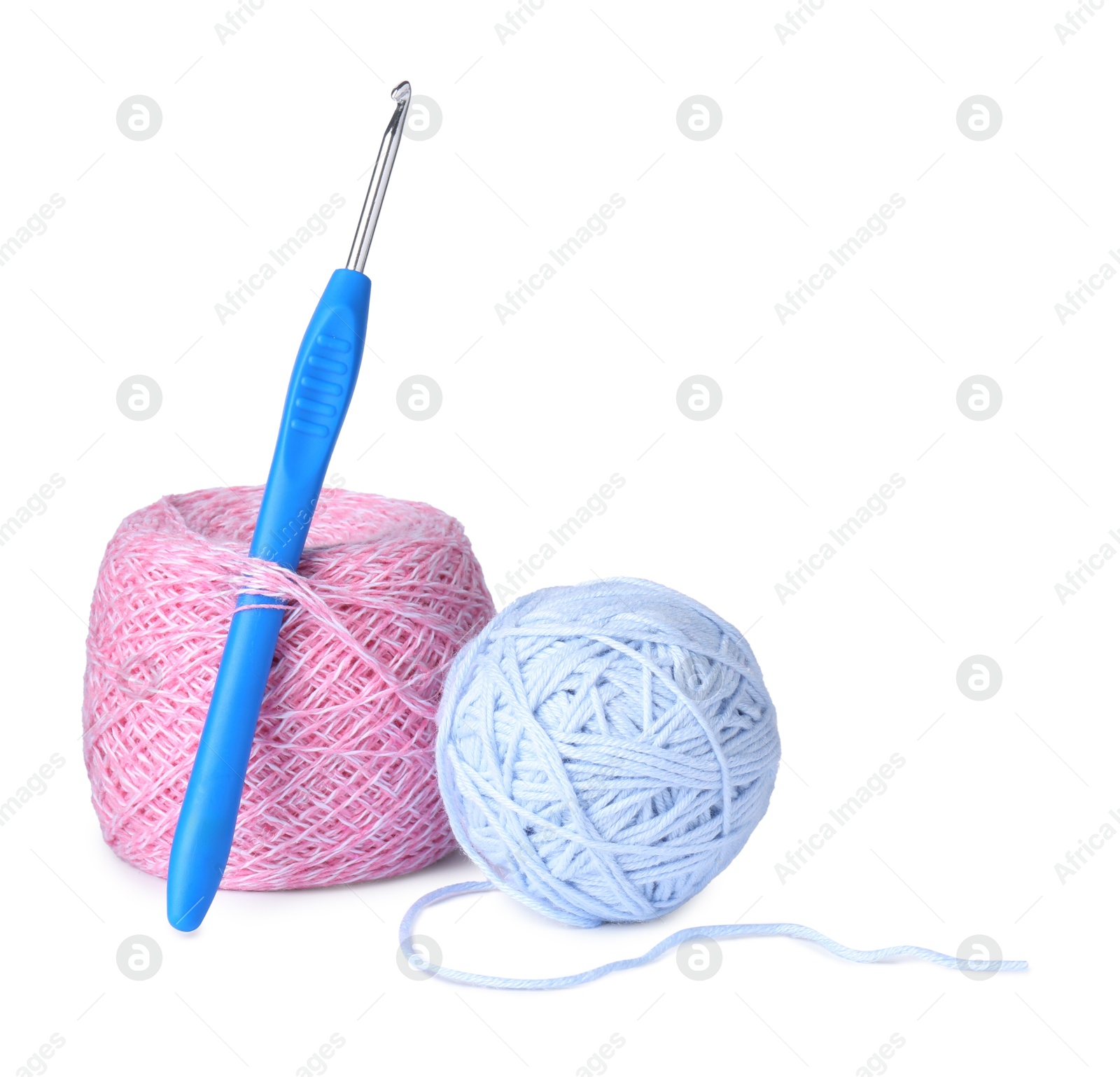 Photo of Colorful yarns and crochet hook isolated on white