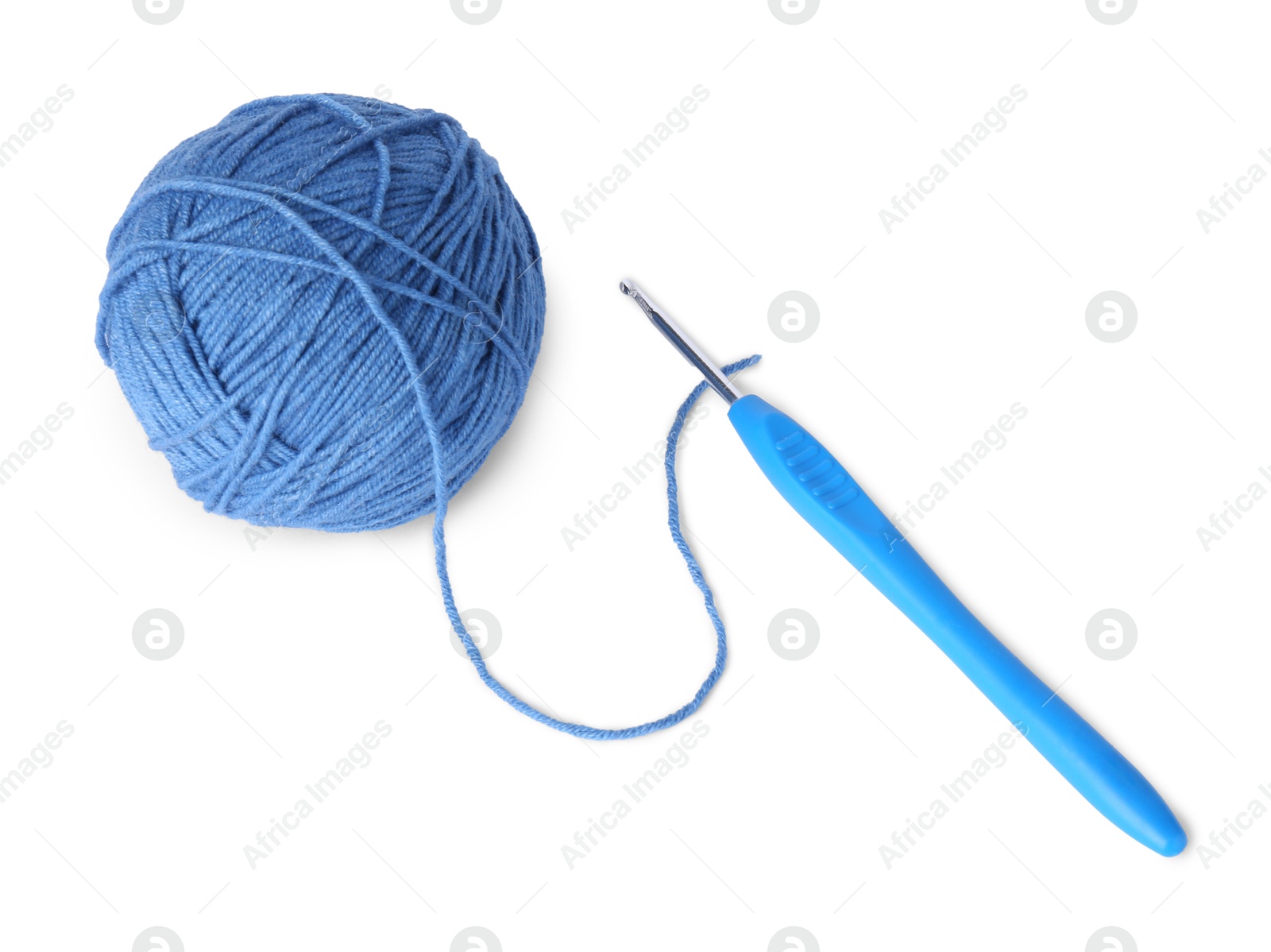 Photo of Ball of light blue yarn and crochet hook isolated on white