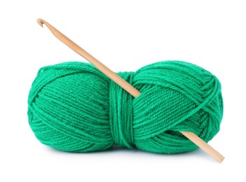 Photo of Green skein of yarn and crochet hook isolated on white