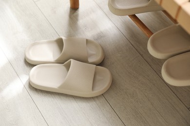 Pair of slippers in entryway at home