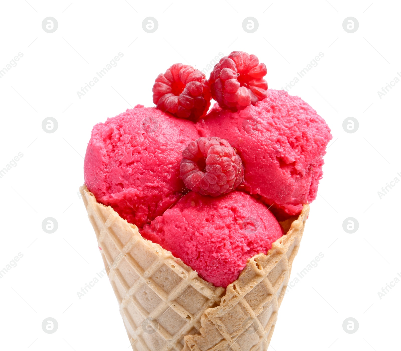 Photo of Wafer cone with delicious raspberry sorbet and fresh berries isolated on white