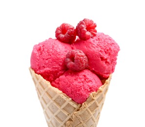 Photo of Wafer cone with delicious raspberry sorbet and fresh berries isolated on white