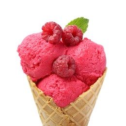 Photo of Wafer cone with delicious raspberry sorbet, mint and fresh berries isolated on white