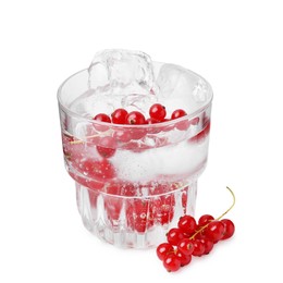 Photo of Refreshing water with red currants in glass isolated on white