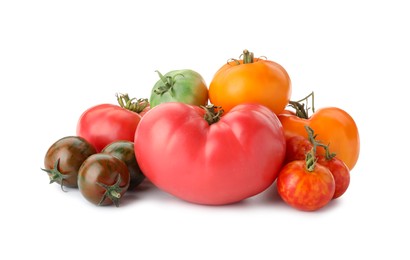 Photo of Different sorts of fresh ripe tomatoes isolated on white