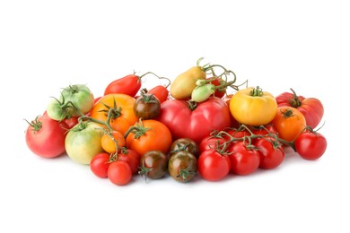 Photo of Different sorts of fresh ripe tomatoes isolated on white