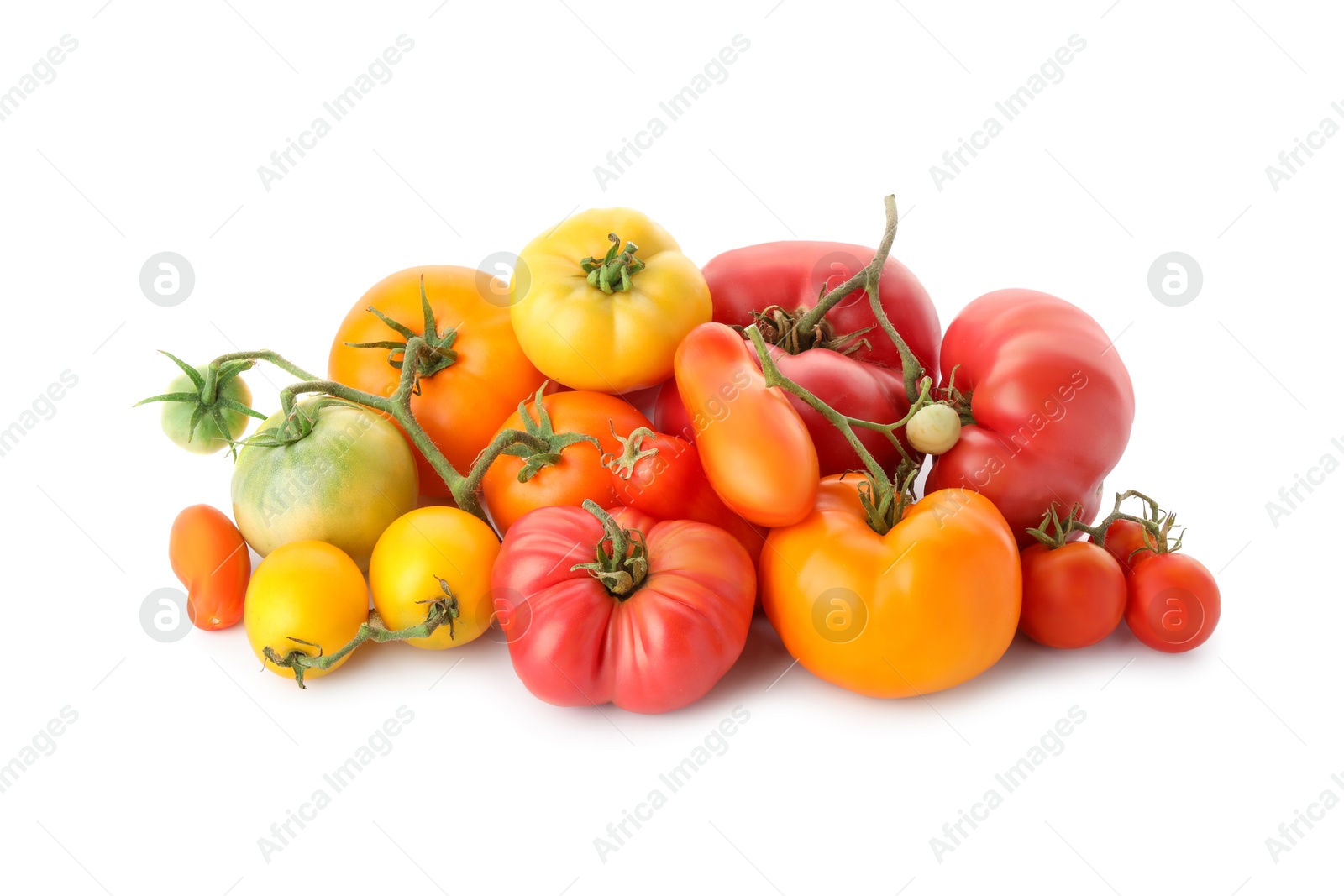 Photo of Different sorts of fresh ripe tomatoes isolated on white