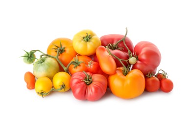 Different sorts of fresh ripe tomatoes isolated on white