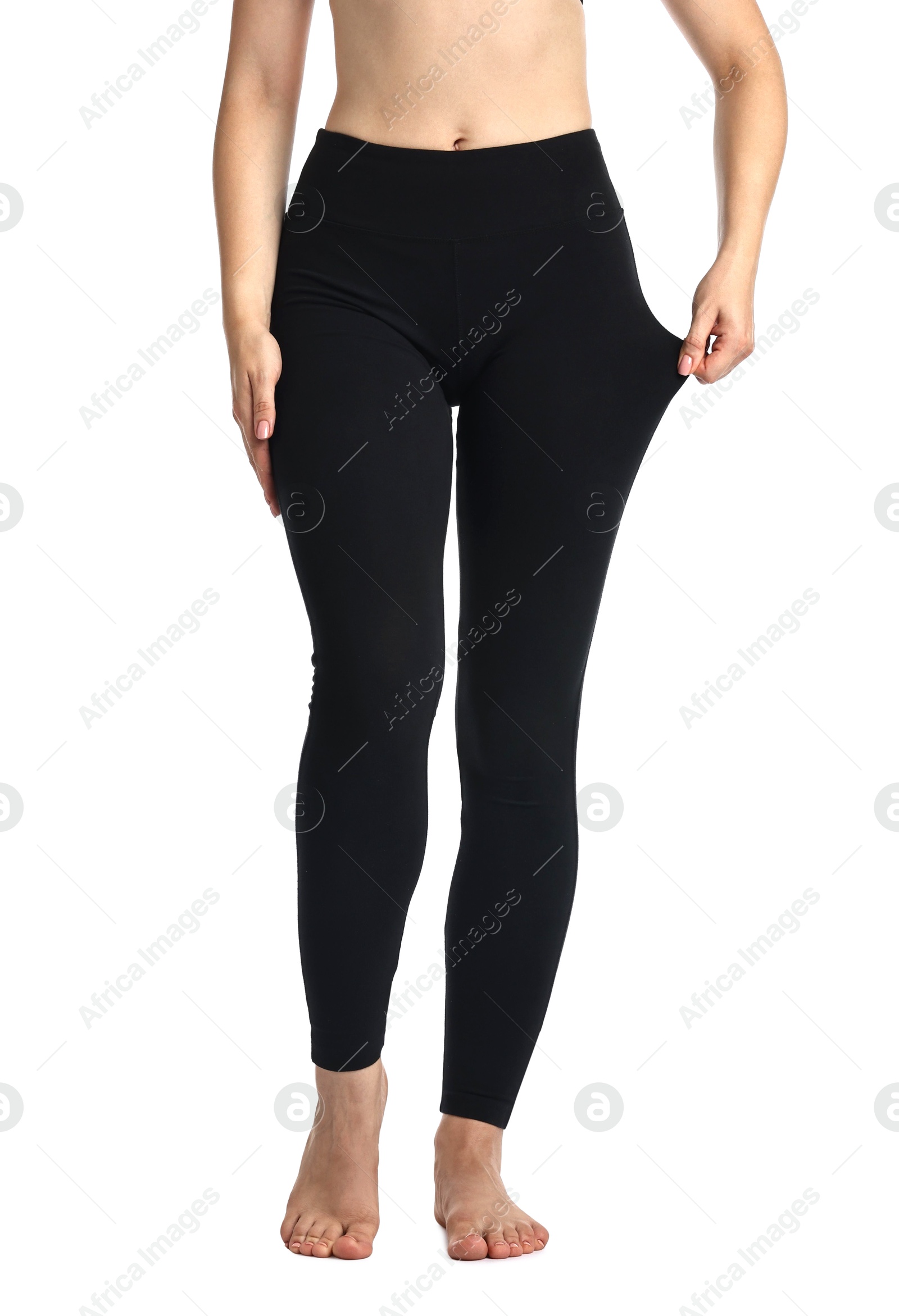 Photo of Woman wearing black sports leggings on white background, closeup