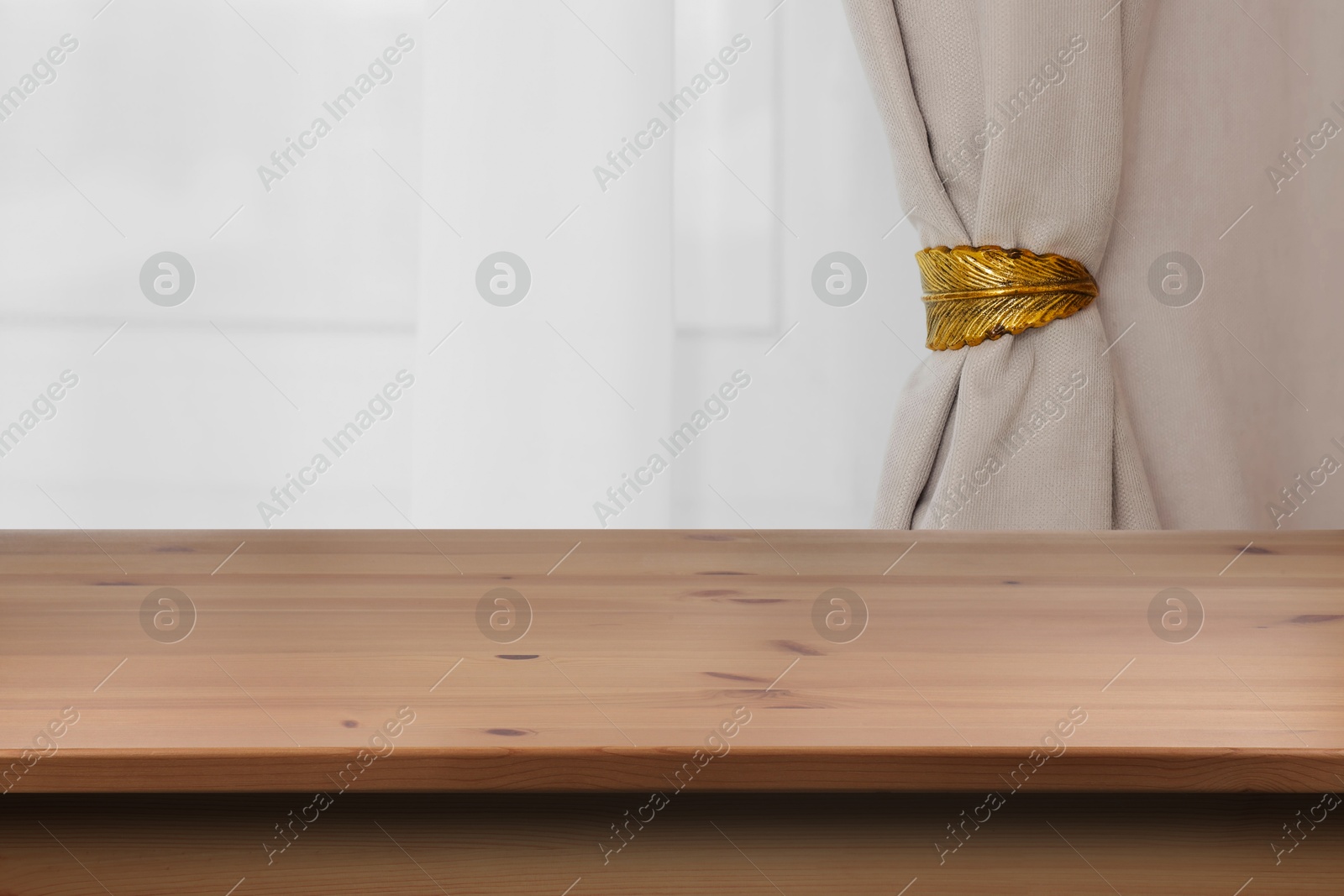 Image of Empty wooden table near window with curtains. Space for design