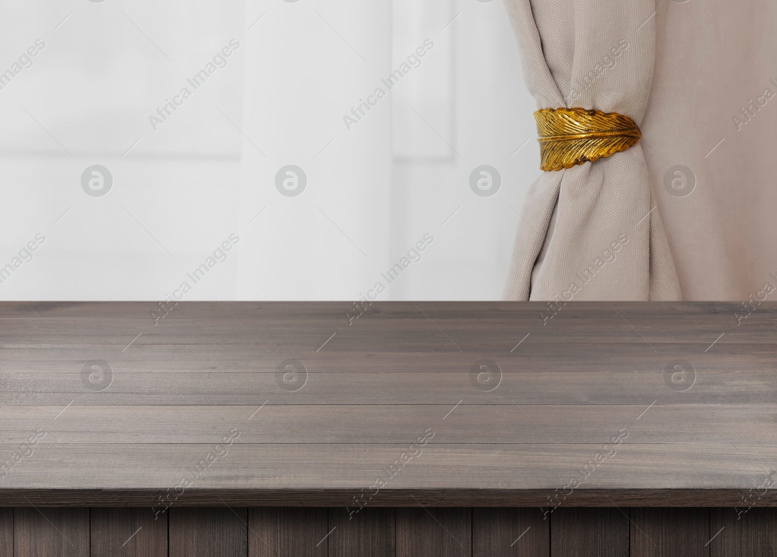 Image of Empty wooden table near window with curtains. Space for design