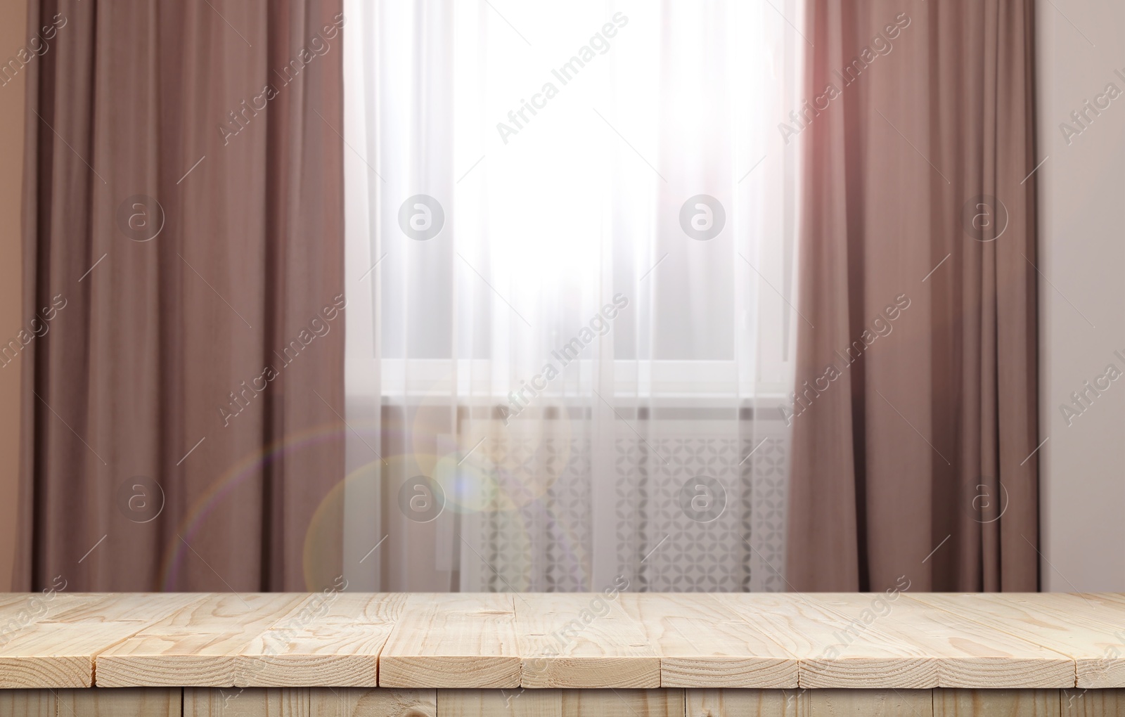 Image of Empty white wooden table near window with curtains. Space for design