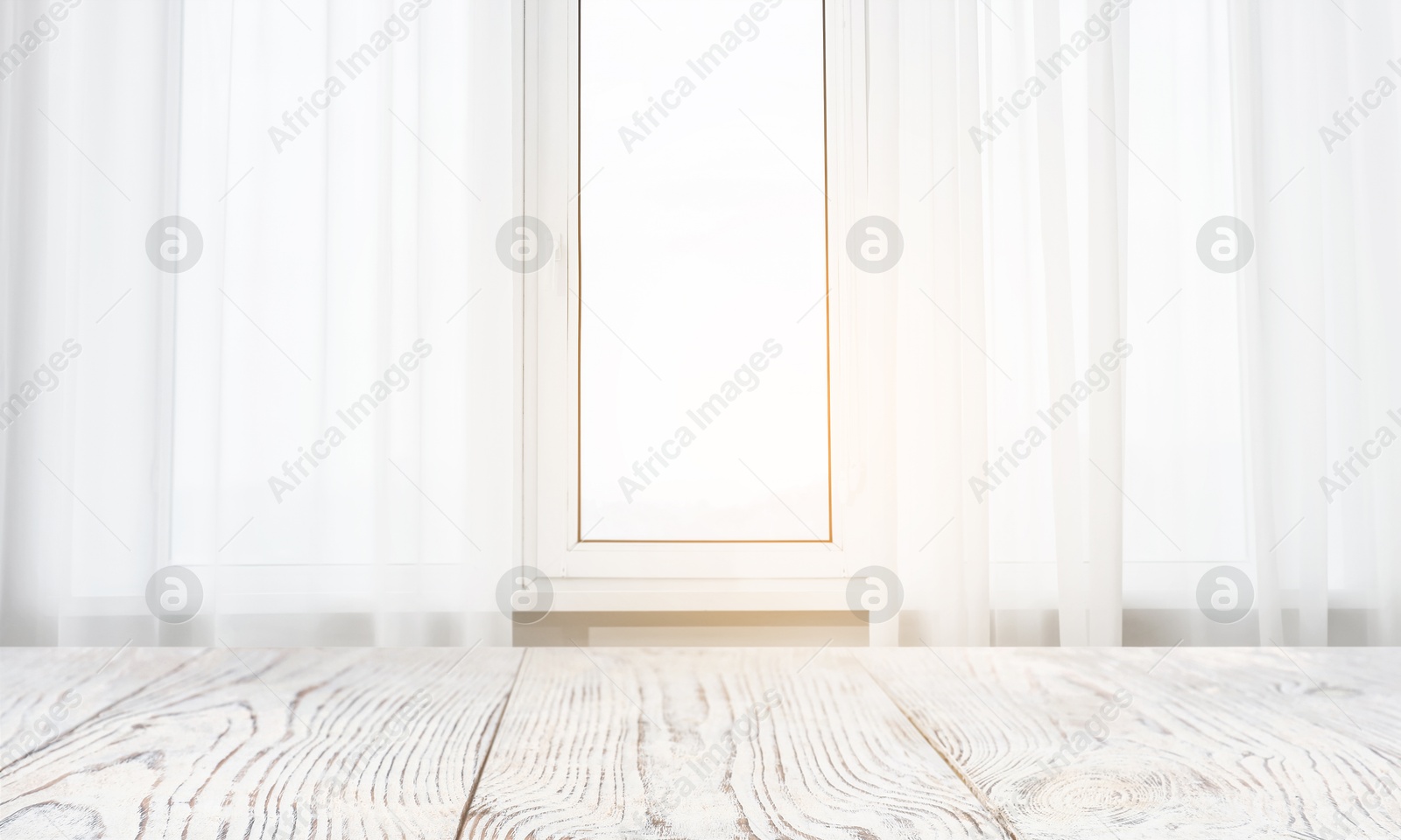 Image of Empty white wooden table near window with curtains. Space for design