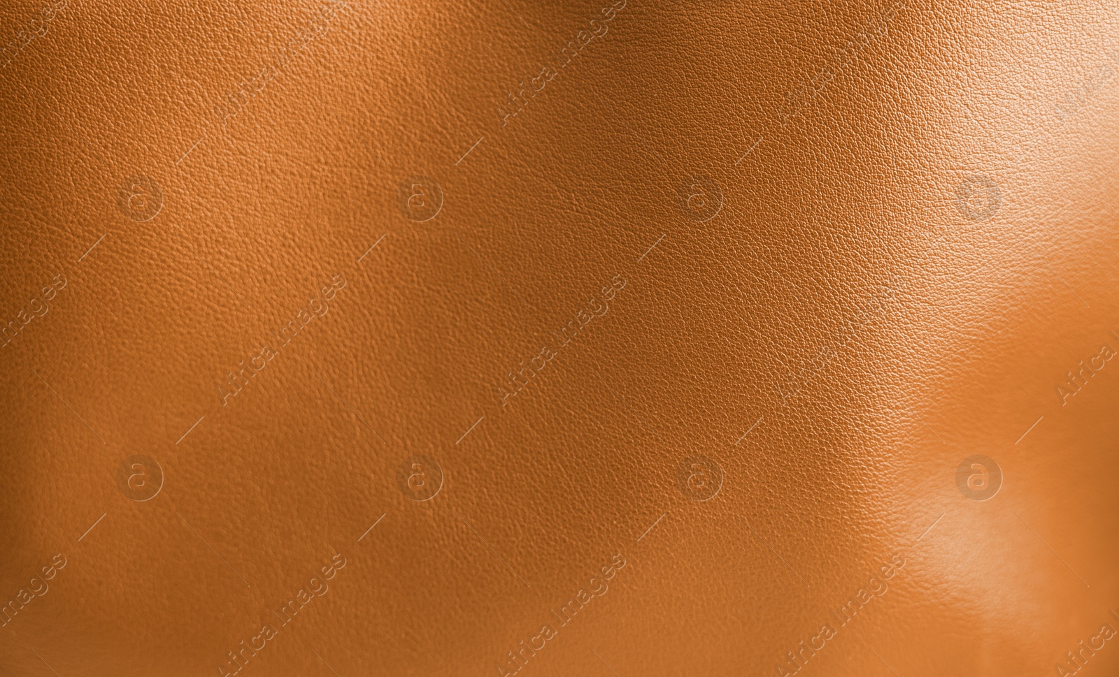 Image of Orange leather, closeup view of material texture. Banner design