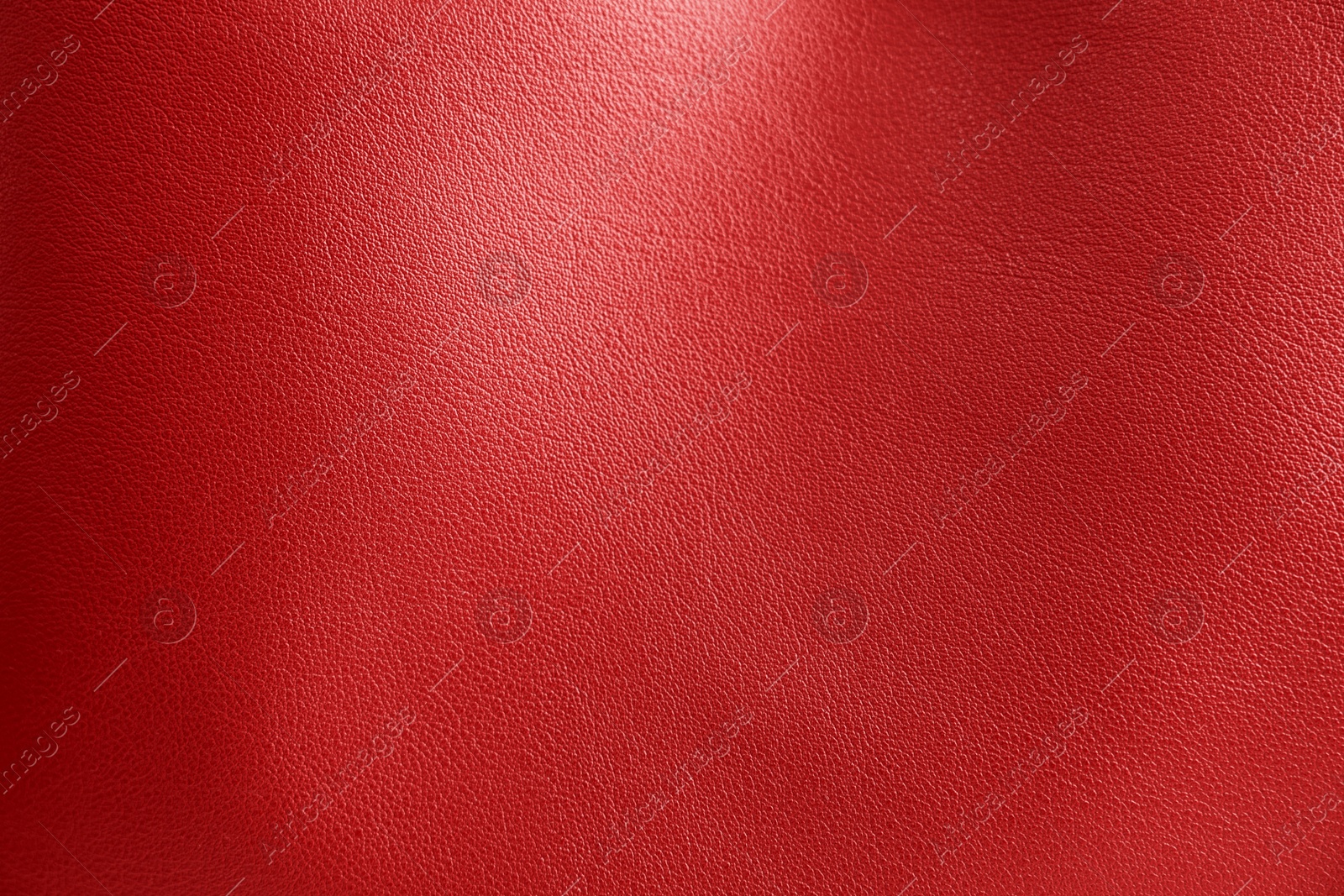 Image of Red leather, closeup view of material texture