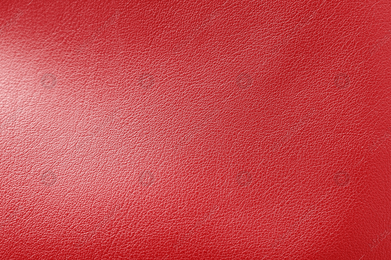 Image of Red leather, closeup view of material texture