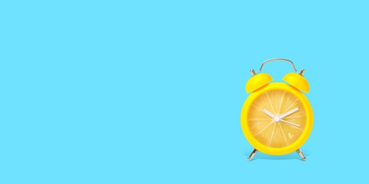 Image of Juicy lemon on alarm clock dial against light blue background. Creative poster with space for text, banner design