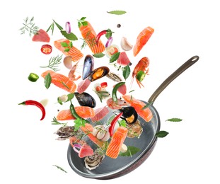 Image of Sea food, vegetables, herbs, spices and frying pan in air on white background. Cooking meal