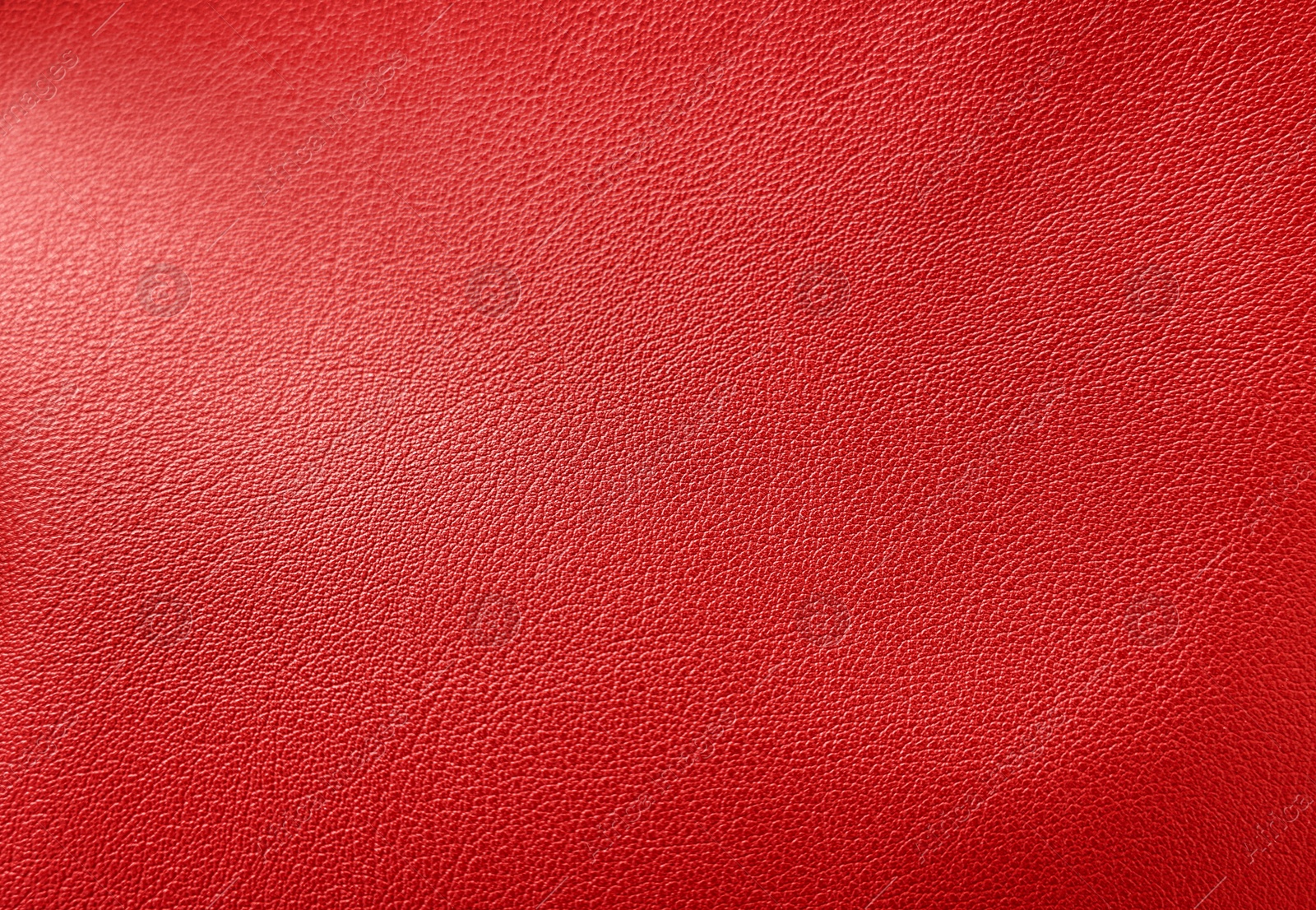 Image of Red leather, closeup view of material texture