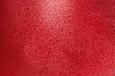 Image of Red leather, closeup view of material texture