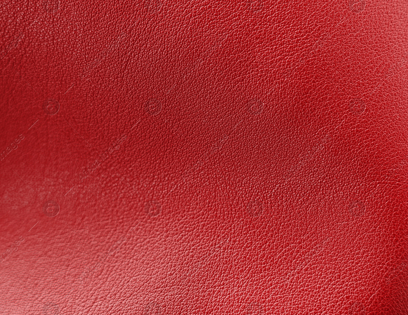 Image of Red leather, closeup view of material texture