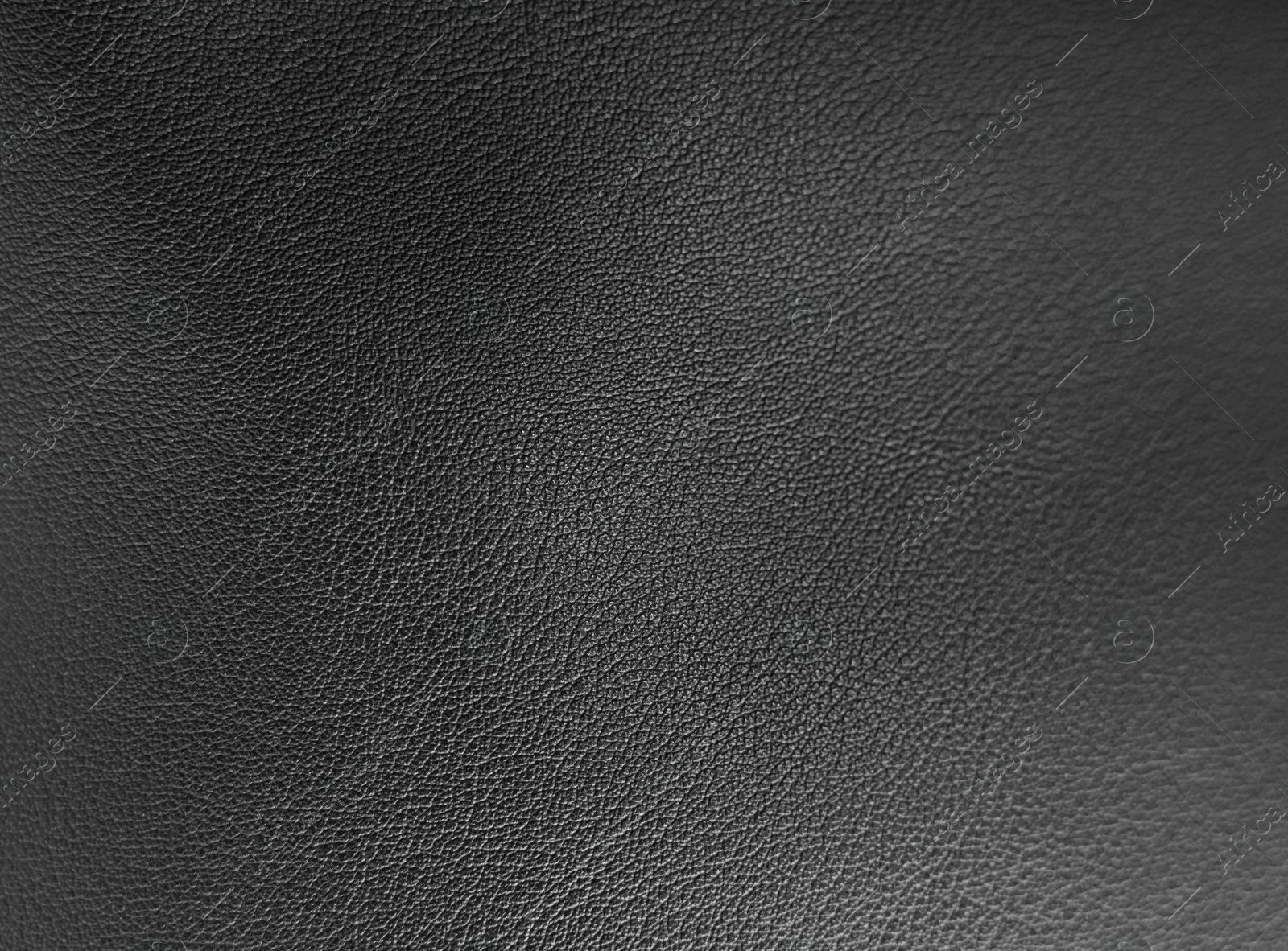 Image of Black leather, closeup view of material texture