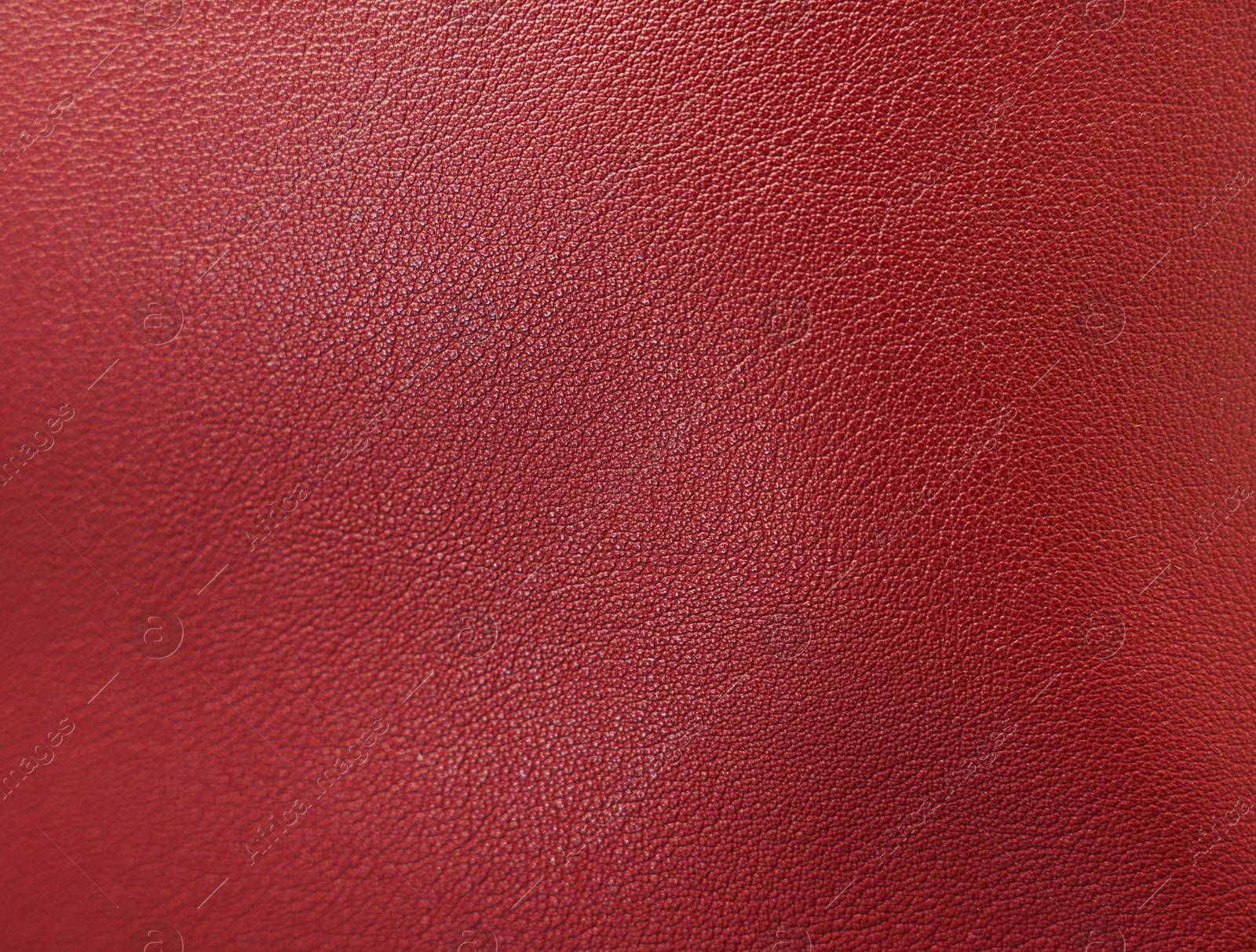 Image of Red leather, closeup view of material texture