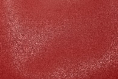 Image of Red leather, closeup view of material texture